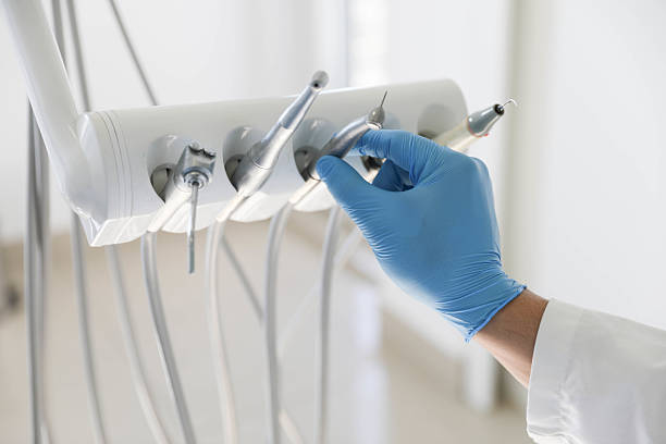 Professional Tooth Extraction technician working in Fairfax, VA